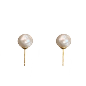 Elegant gold plated pearl stud earrings with sterling silver pins on white background
