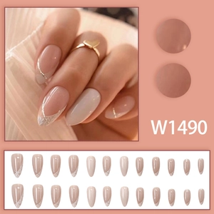 Almond shaped press-on nails with white French tips and silver glitter accents