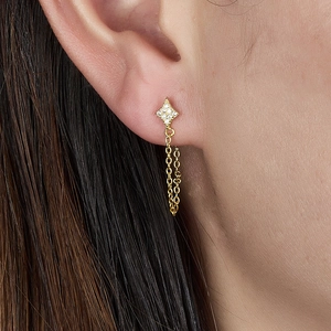 Elegant gold star stud earrings with diamond accents and long metal chain tassels
