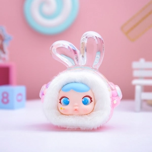 Close-up of plush blind box figure with rabbit ears in a pink candy themed setting