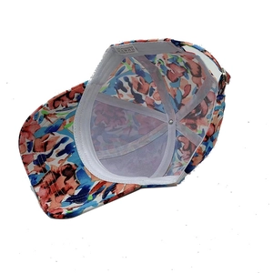 Floral print baseball cap with colorful abstract pattern shown from an interior view