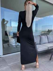 Slim fit black long sleeve maxi dress with back slit and elegant bodycon silhouette
