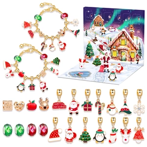 DIY Christmas advent calendar set with gold bracelets and assorted festive charms