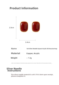 Detail view of red square acrylic earrings with gold rope edges and size specifications