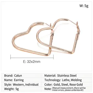Detail of rose gold heart-shaped stainless steel earrings with textured finish and dimensions
