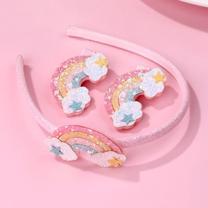 Sparkly rainbow cloud headband and hair clips set for girls on a soft pink background