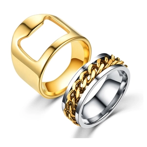 Closeup of stainless steel men rings featuring a gold bottle opener and chain spinner design.