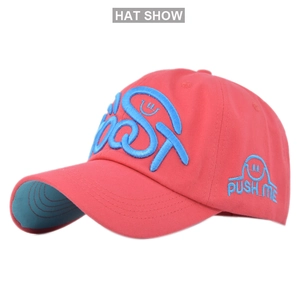 Detail of pink baseball cap featuring 3D blue embroidery and side PUSH ME smiley patch