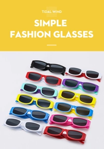 Flat lay of colorful rectangular candy-colored kids sunglasses in Y2K retro fashion style