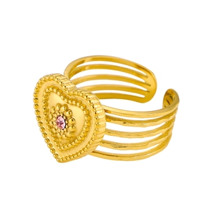 Vintage heart shaped gold ring with pink gemstone and adjustable open band design