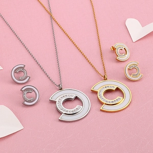Elegant gold and silver titanium steel C-shaped shell necklace and earring sets