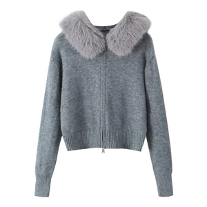 Close-up of grey zip-up cardigan featuring a plush faux fur collar and ribbed knit texture