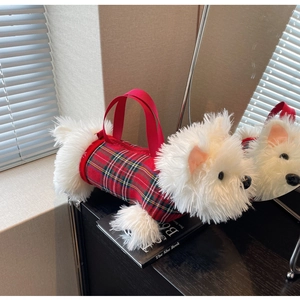 Detail of Westie dog plush handbag with red tartan fabric and soft white fur textures