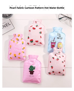 Detailed view of pearlescent fabric hot water bags with various cute fruit patterns