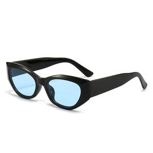 Fashionable black cat-eye sunglasses with light blue lenses shown from a 45-degree angle