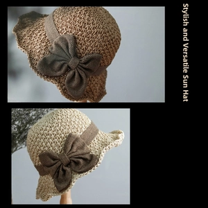 Close-up of handmade straw hats with ribbon bows in dark brown and beige tones