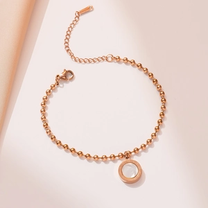 Rose gold stainless steel beaded bracelet with Roman numeral shell pendant for women