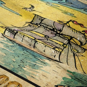 Close-up of vintage sailing ship tapestry fabric showing texture and digital printing