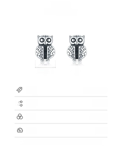 Detail view of 925 sterling silver owl earrings showing 4.5x6.5mm size and vintage texture