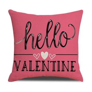 Detail view of pink linen Valentine cushion cover featuring hello VALENTINE text and hearts