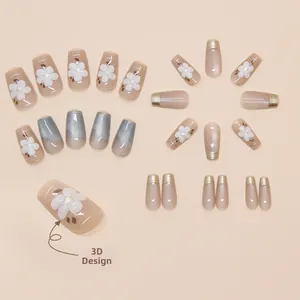 Detail of 3D embossed flowers and cat-eye gradient on long trapezoid press-on nails