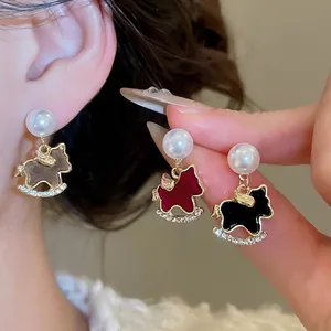 Elegant rocking horse pearl earrings with diamond accents in three classic vintage colors