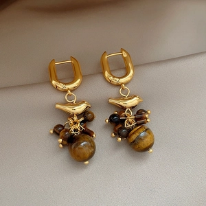 18k gold plated bird earrings with tiger eye stone beaded tassels on champagne silk