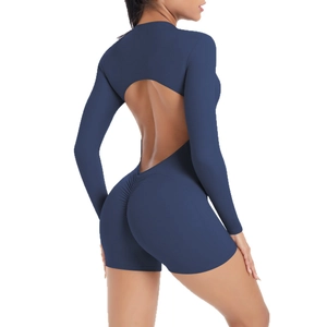 Navy blue long sleeve backless yoga romper with ruched peach lift and open back design