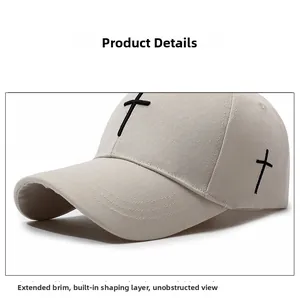 Detail of cross embroidery and durable twill fabric on beige cotton baseball cap