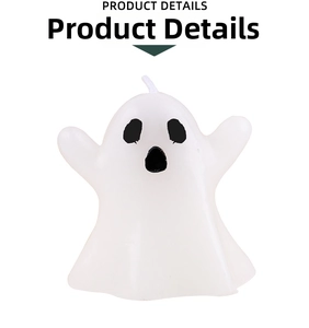 Macro shot of white ghost candle with cute black facial details for Halloween decor