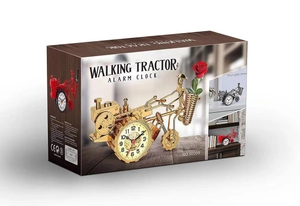 Detail of the vintage walking tractor alarm clock packaging with AA battery requirement