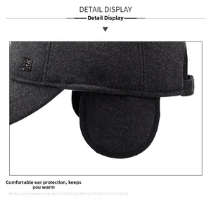 Close-up of warm wool blend baseball cap with ear flaps and metal logo detail