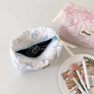 Quilted bow makeup bags in pink and white with Hiso Cute label for storage