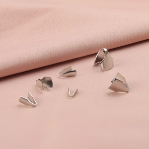 Silver stainless steel V-shape pinch bails for pendant DIY jewelry making on pink fabric