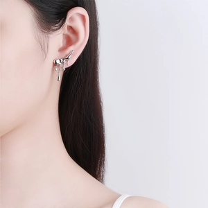 Minimalist liquid metal stud earrings in silver finish for a trendy 18K look