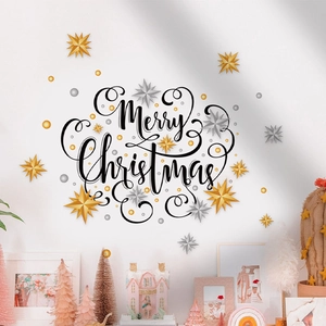 Detail of black Merry Christmas wall sticker with gold and silver stars on white background
