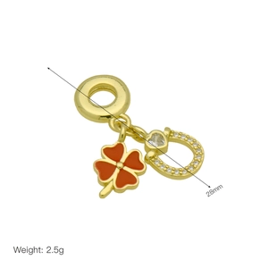 18k gold plated four-leaf flower pendant with orange enamel and crystal horseshoe ring