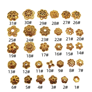 Lot de 31 styles de calottes fleurs dorées pour la création de bijoux DIY et épingles
