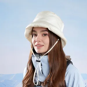 Quilted off-white winter bucket hat with ear protection and windproof chin strap