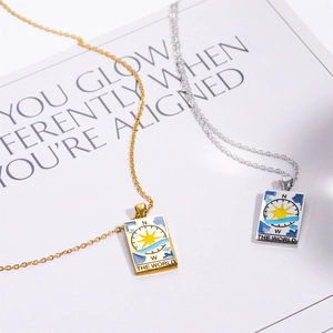 Vintage gold and silver stainless steel tarot pendant necklace featuring the world pattern