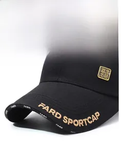 Detail of gold letter embroidery and metal logo plate on black cotton baseball cap
