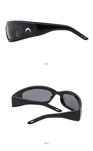 Detail view of black Y2K futuristic sunglasses showing side and back wrap structure