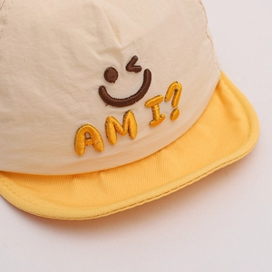 Baby quick-dry soft brim cap with embroidered smiley face and contrast yellow visor