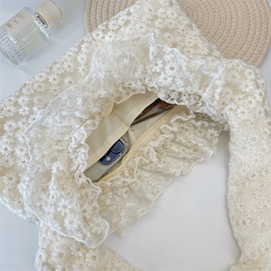Detailed interior of lace daisy tote bag showing zipper pocket and spacious storage
