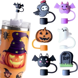 Macro detail of Halloween silicone straw covers featuring ghost pumpkin and bat designs