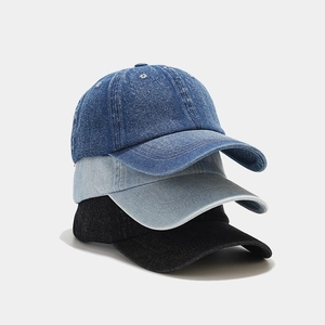 Classic denim baseball caps in dark blue, light blue, and charcoal colors for men and women