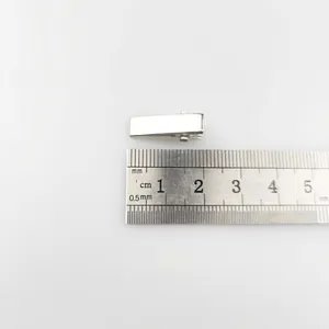 Set of 2cm macaron color metal alligator hair clips with a ruler showing the mini size
