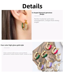 Detailed view of U-shaped gold earrings with micro-set zircons and colorful enamel accents