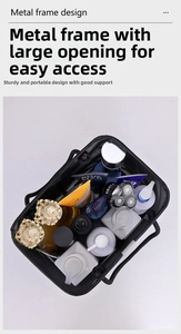 Detail of black mesh shower caddy showing metal frame and spacious interior storage
