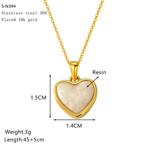 Detailed spec sheet showing gold heart pendant measurements and 18K gold plated steel specs